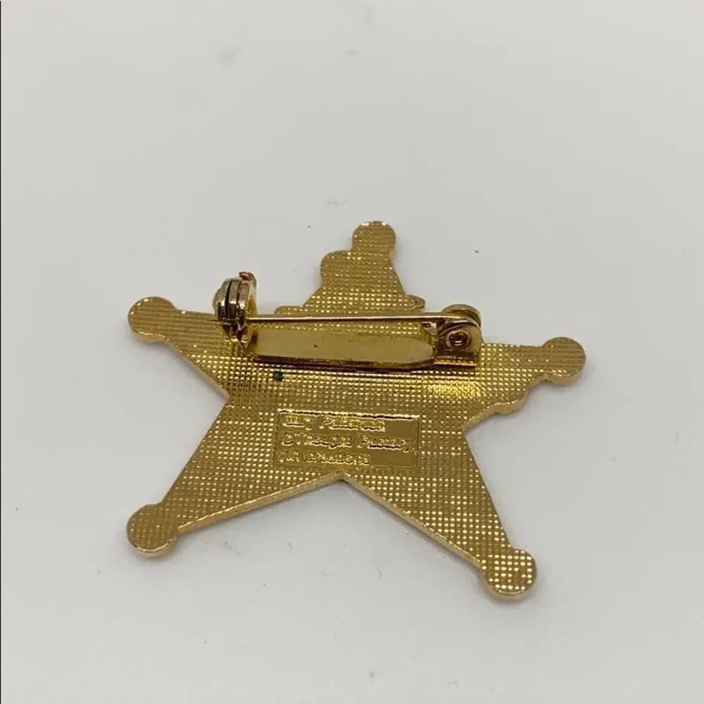 A cowboy on a Rockinghorse sheriff star pin